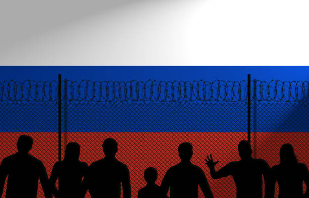 istock Russian Flag Behind Secure Fence 1007471564
