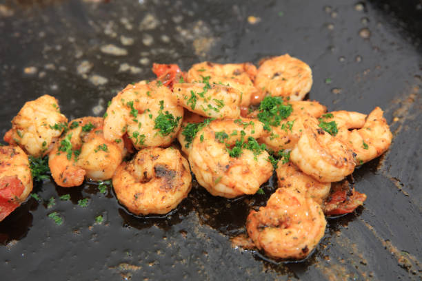 istock Fresh Shrimps on Barbecue Grill in Germany 1007474482