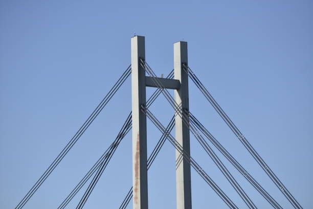 Closeup large complicated bridge steel structure, white background with copy space, full frame horizontal composition