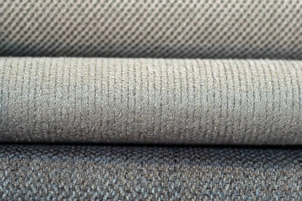 istock Catalog of multicolored cloth from matting fabric texture background, silk fabric texture, textile industry background 1007485256