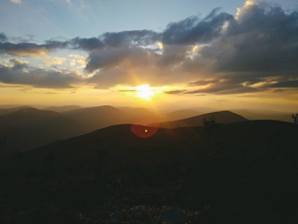 istock The sun going down in the mountains 1007485504