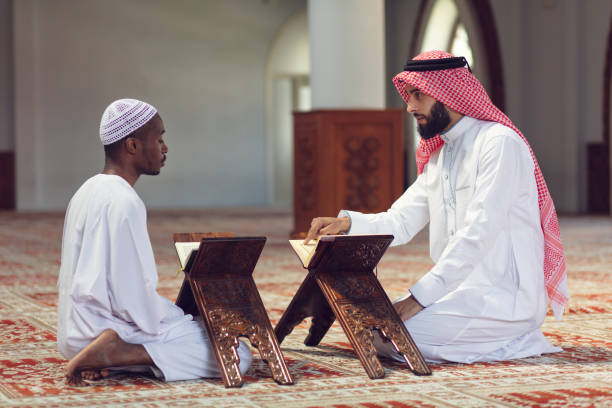 istock Two Religious muslim man praying inside the mosque 1007488132