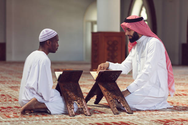 istock Two Religious muslim man praying inside the mosque 1007491100