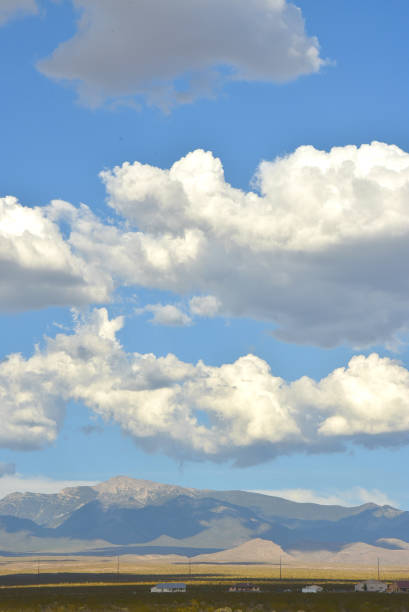istock clouds over the Spring Mountains in the Mojave Desert, Pahrump, Nevada, USA 1007491438