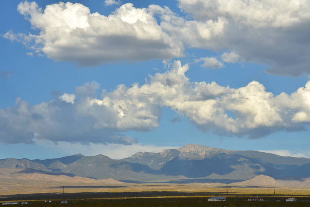 istock clouds over the Spring Mountains in the Mojave Desert, Pahrump, Nevada, USA 1007491464