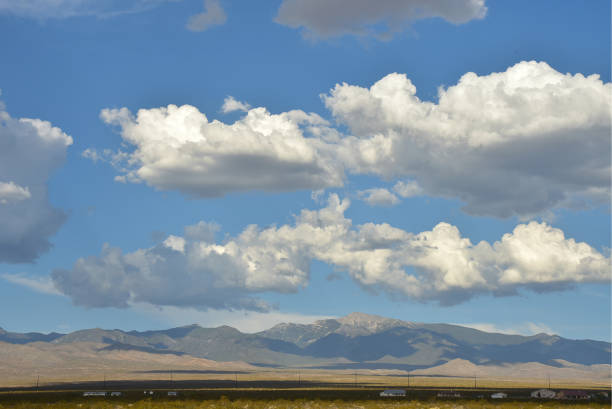 istock clouds over the Spring Mountains in the Mojave Desert, Pahrump, Nevada, USA 1007491676