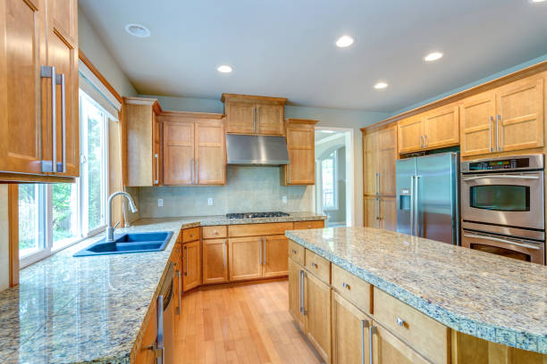 istock Amazing kitchen room with honey colored cabinets. 1007498140