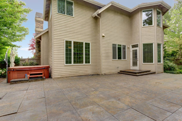 istock Backyard view of a luxurious house with patio 1007498318