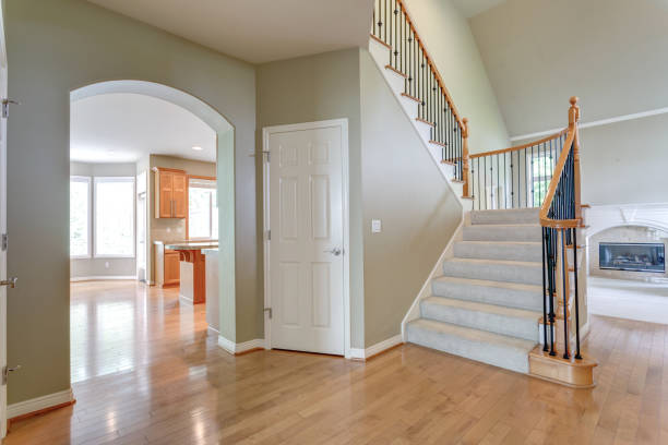 istock Chic foyer with traditional staircase. 1007498524