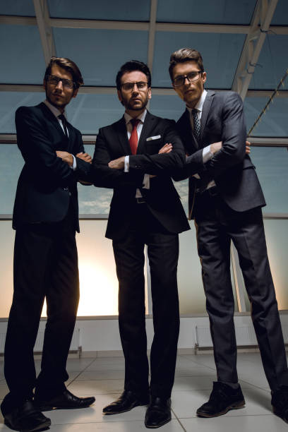 istock in full growth.three confident businessmen look forward 1007516958