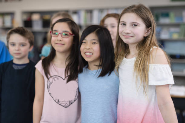 istock Portrait of 4th grade students 1007522306