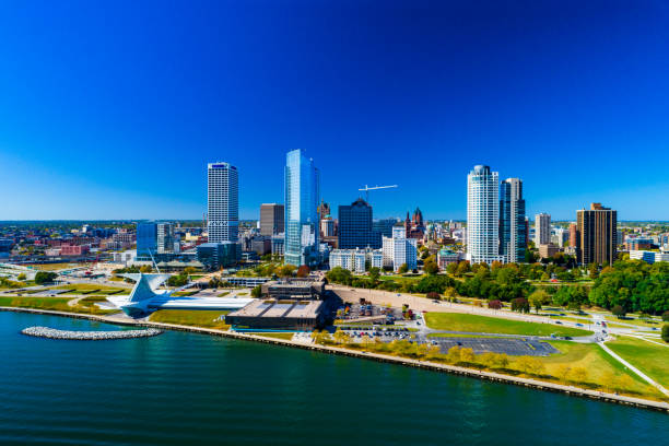 Milwaukee Skyline And Shoreline Aerial Downtown Milwaukee skyline view with the shoreline of Lake Michigan in the foreground. lake michigan stock pictures, royalty-free photos & images