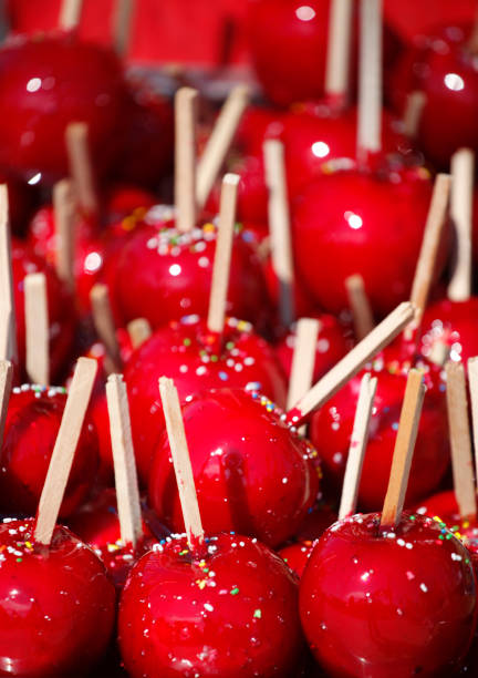 istock Delicious candy apples covered with colorful sprinkles 1007532718