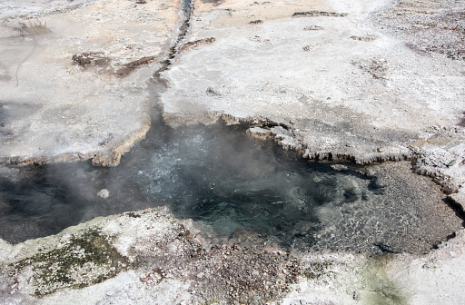 Bubbling hot spring with silica depostis at geothermal reserve, Orakei Korako, in Rotorua, New Zealand