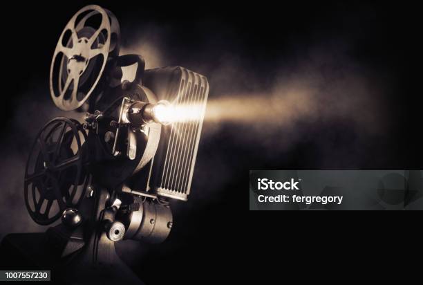 Movie Projector On Dark Background Stock Photo - Download Image Now - Movie, Movie Theater, Film Industry