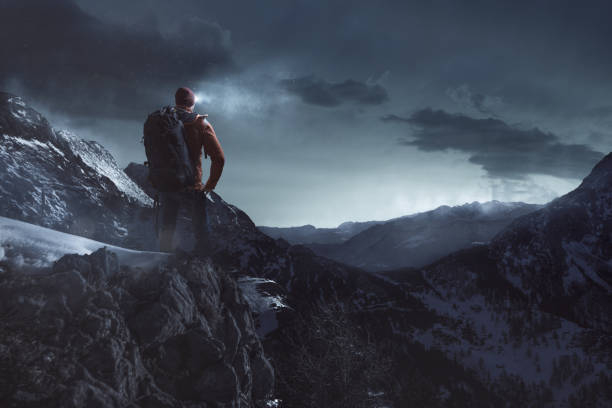 istock Hikers at sunrise on a mountain 1007574096