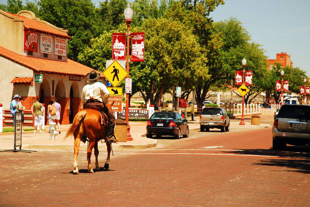 Ft Worth, TX, USA May 18, 2008 OA police officer on horseback patrols the stockyards in Fort Worth, Texas