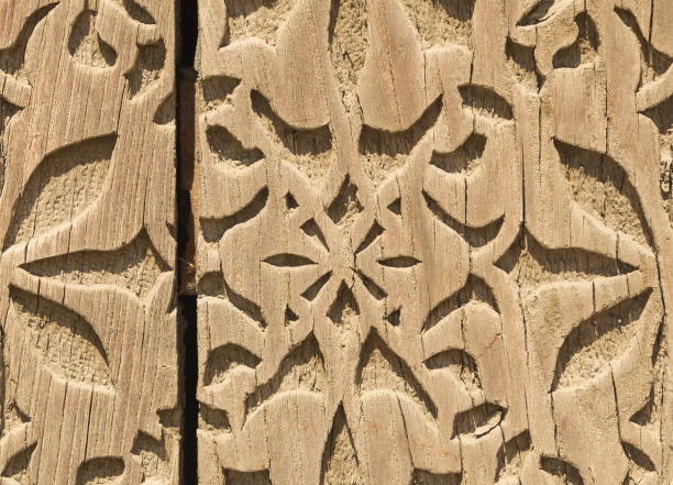 istock Pattern of flower carved on wood for decoration 1007585238