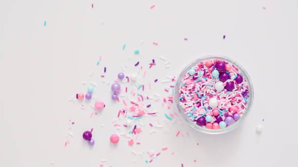 istock Colorful purple sprinkle blend on a white background. 1007585408