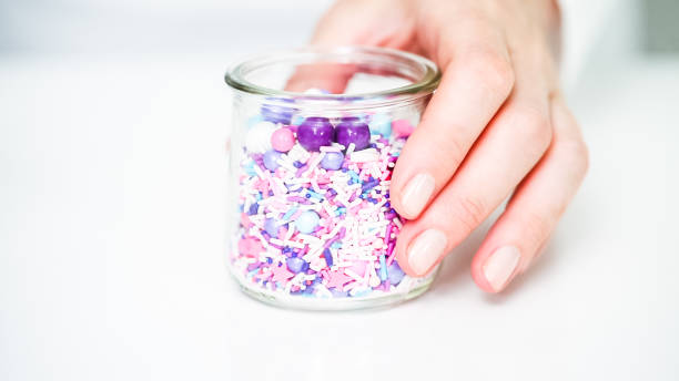 istock Colorful purple sprinkle blend on a white background. 1007585432