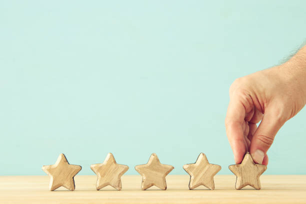 istock concept image of setting a five star goal. increase rating or ranking, evaluation and classification idea. 1007613392