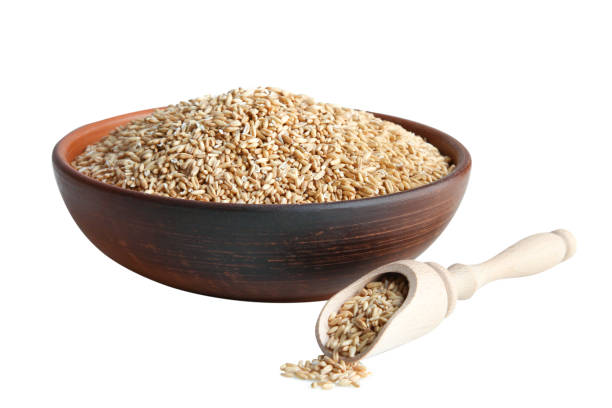 istock Oat groats in wooden bowl 1007627664