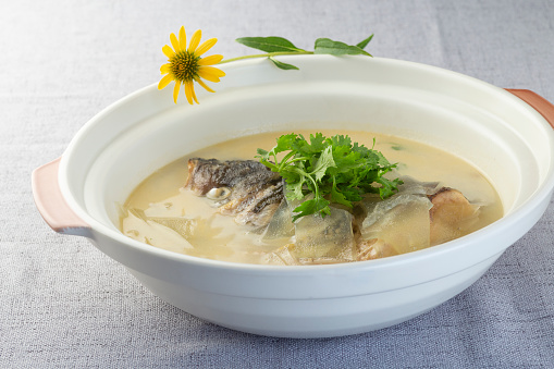 Chinese traditional way of cooking fish soup