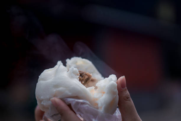 Put the steaming pork bun.