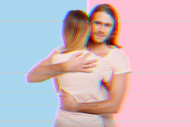 istock Happy man smiling and hugging his girlfriend 1007651728