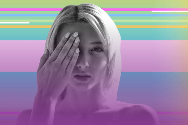 istock Young blonde girl closing one eye and checking her eyesight 1007652292