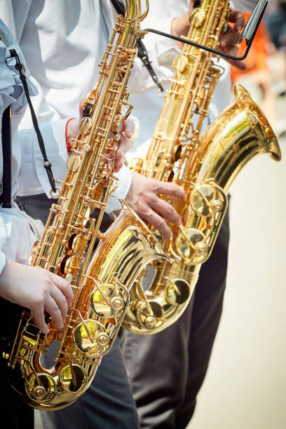 istock Two musicians play saxophones 1007661702