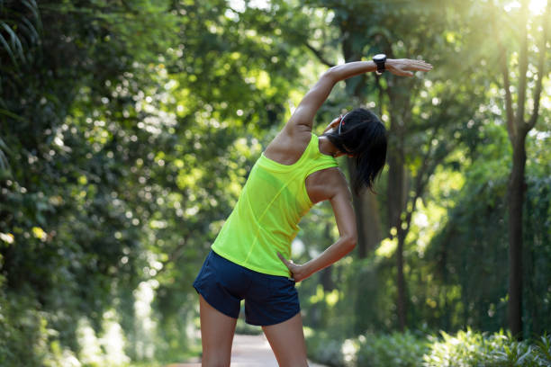 istock Healthy young woman stretching before run 1007661970