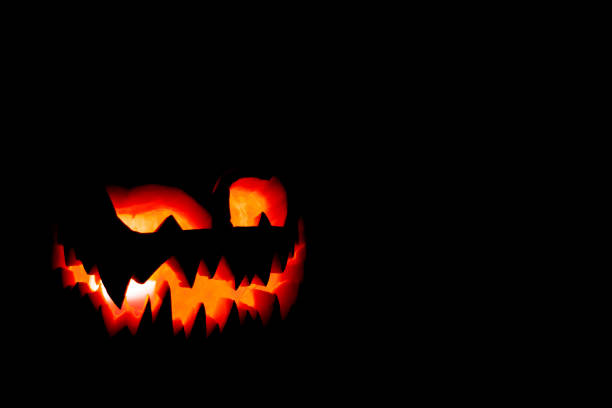Spooky glowing Halloween pumpkin face