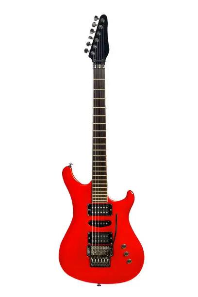 Extreme rock guitar in bright red, with whammy bar and three pickups.