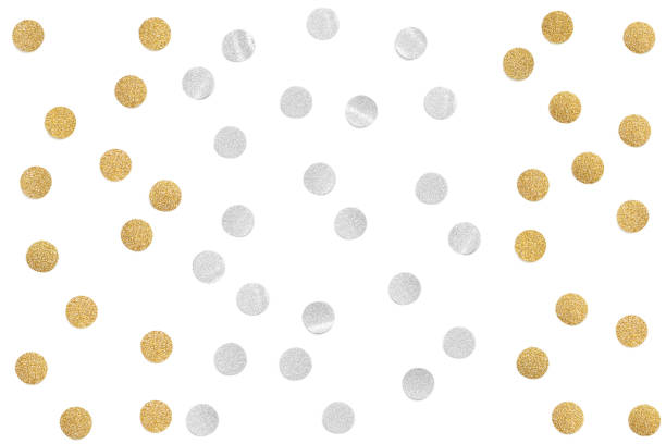 istock Gold and silver glitter confetti paper cut on white background 1007698914