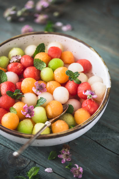 Summer Salad Watermelon and Melon with Mint and Violet Syrup