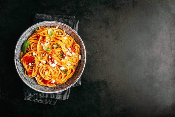 istock Italian pasta with tomato sauce in bowl 1007705534