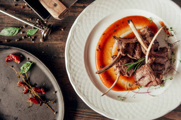 istock mutton ribs dish top view composotion with red sauce at dark wooden background 1007705928