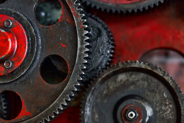 istock Metal gears on a red background 1007706028