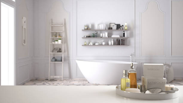 istock Spa, hotel bathroom concept. White table top or shelf with bathing accessories, toiletries, over blurred scandinavian vintage bathroom, modern architecture interior design 1007708926
