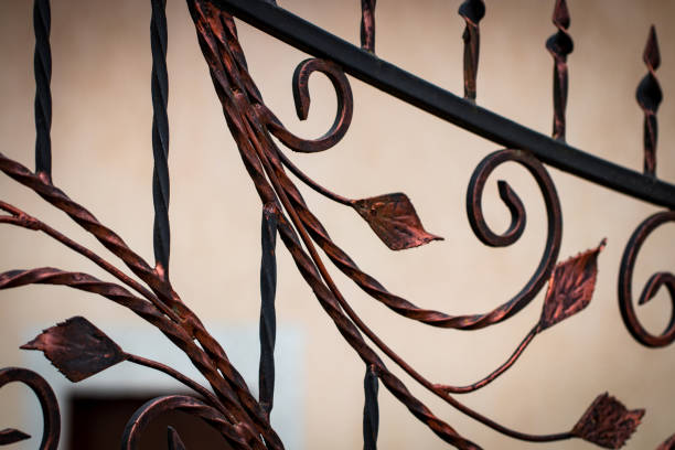 istock ornate wrought-iron elements of metal gate decoration 1007710610