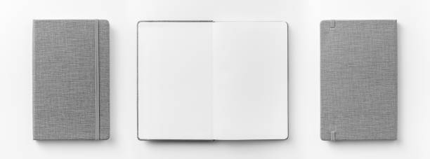 istock Top view collection of  grey notebook front, back pen, and white open page isolated on background for mockup 1007711626