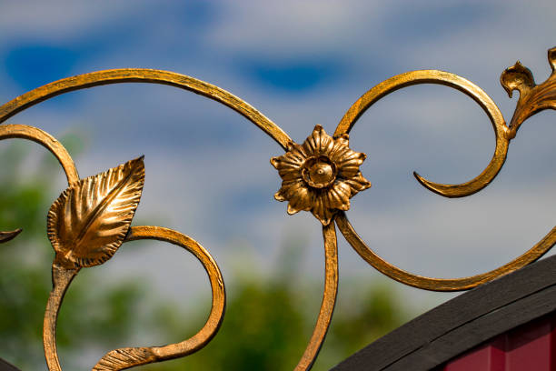 istock ornate wrought-iron elements of metal gate decoration 1007711772