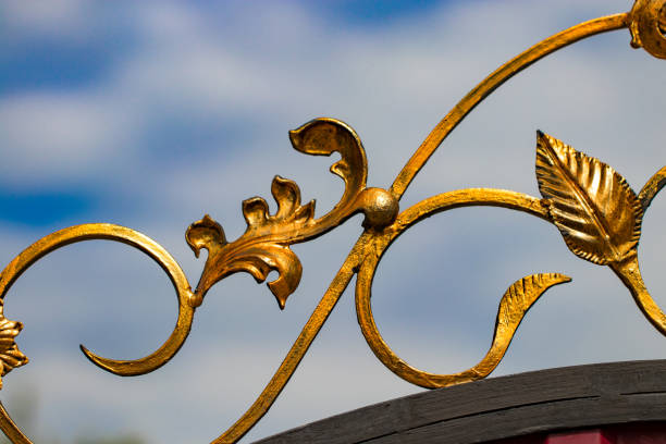 istock ornate wrought-iron elements of metal gate decoration 1007712720