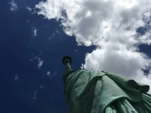 Unique upward picture of the Statue of Liberty in New York