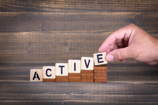 istock active. wooden letters on the office desk 1007716604