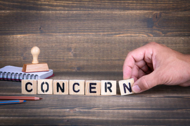 istock concern. wooden letters on the office desk 1007716816