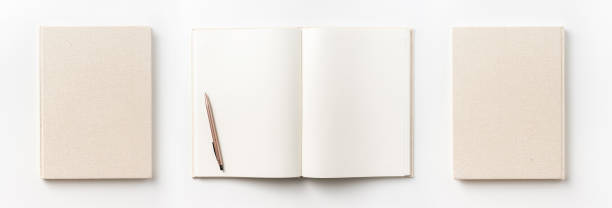 istock Top view collection of  light yellow fabric notebook front, back , pen and white open page isolated on background for mockup 1007716964