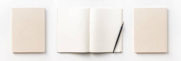 istock Top view collection of  light yellow fabric notebook front, back , pen and white open page isolated on background for mockup 1007717138