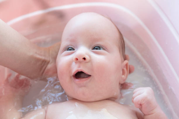 istock happy baby in the bath 1007717278